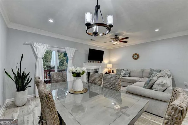 a kitchen with a table and chairs in it