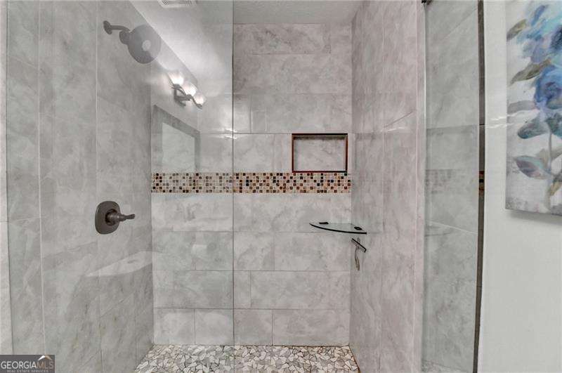 2066 Pinnacle Pointe Drive Norcross, GA 30071 - Photo 46 of 56 a bathroom with a shower