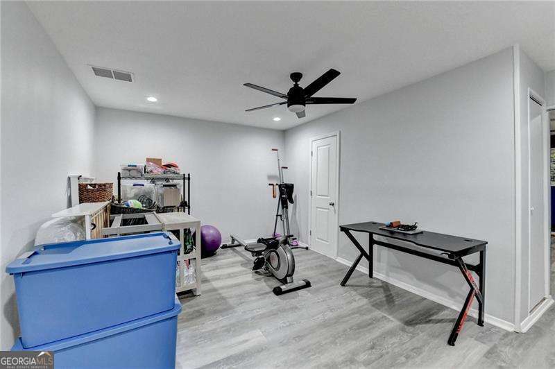 2066 Pinnacle Pointe Drive Norcross, GA 30071 - Photo 47 of 56 a view of a workspace with furniture and gym equipment
