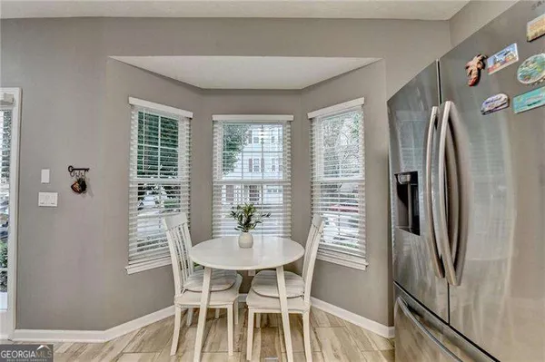 a kitchen with a sink stove and microwave