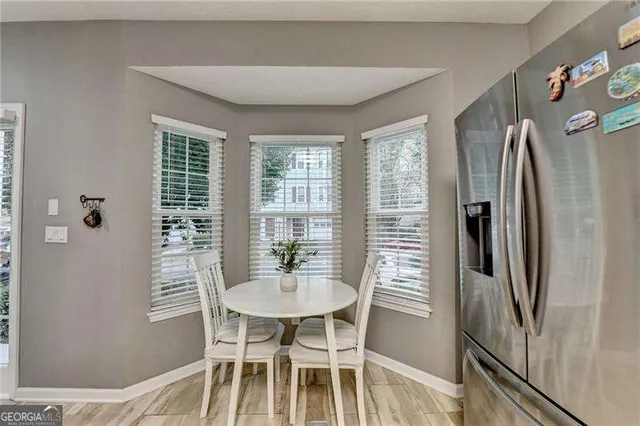 a kitchen with a sink stove and microwave