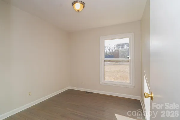 a view of a livingroom from a hallway