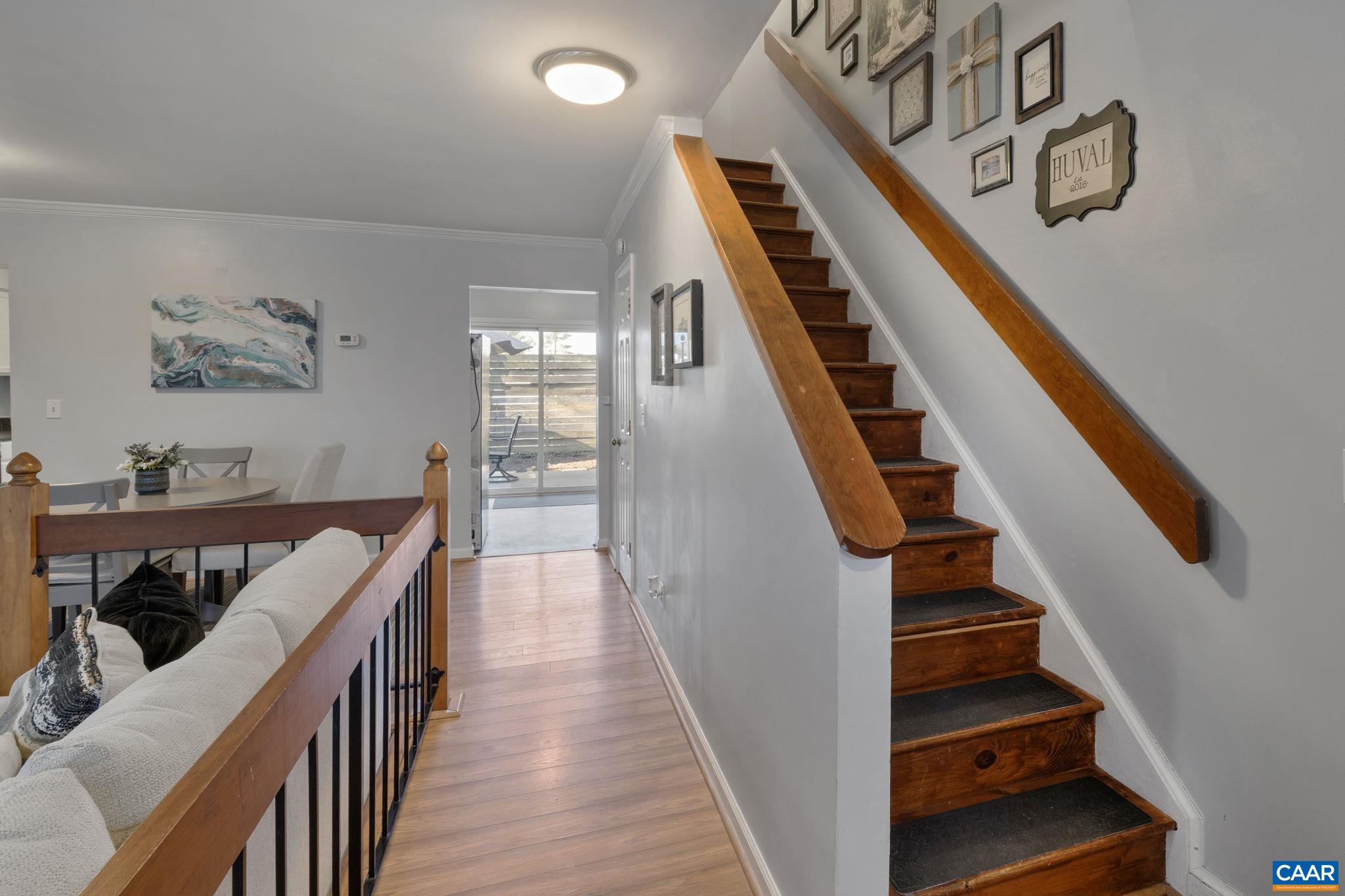 1540 Minor Ridge Court Charlottesville, VA 22901 - Photo 13 of 26 a view of a hallway with wooden floor and staircase