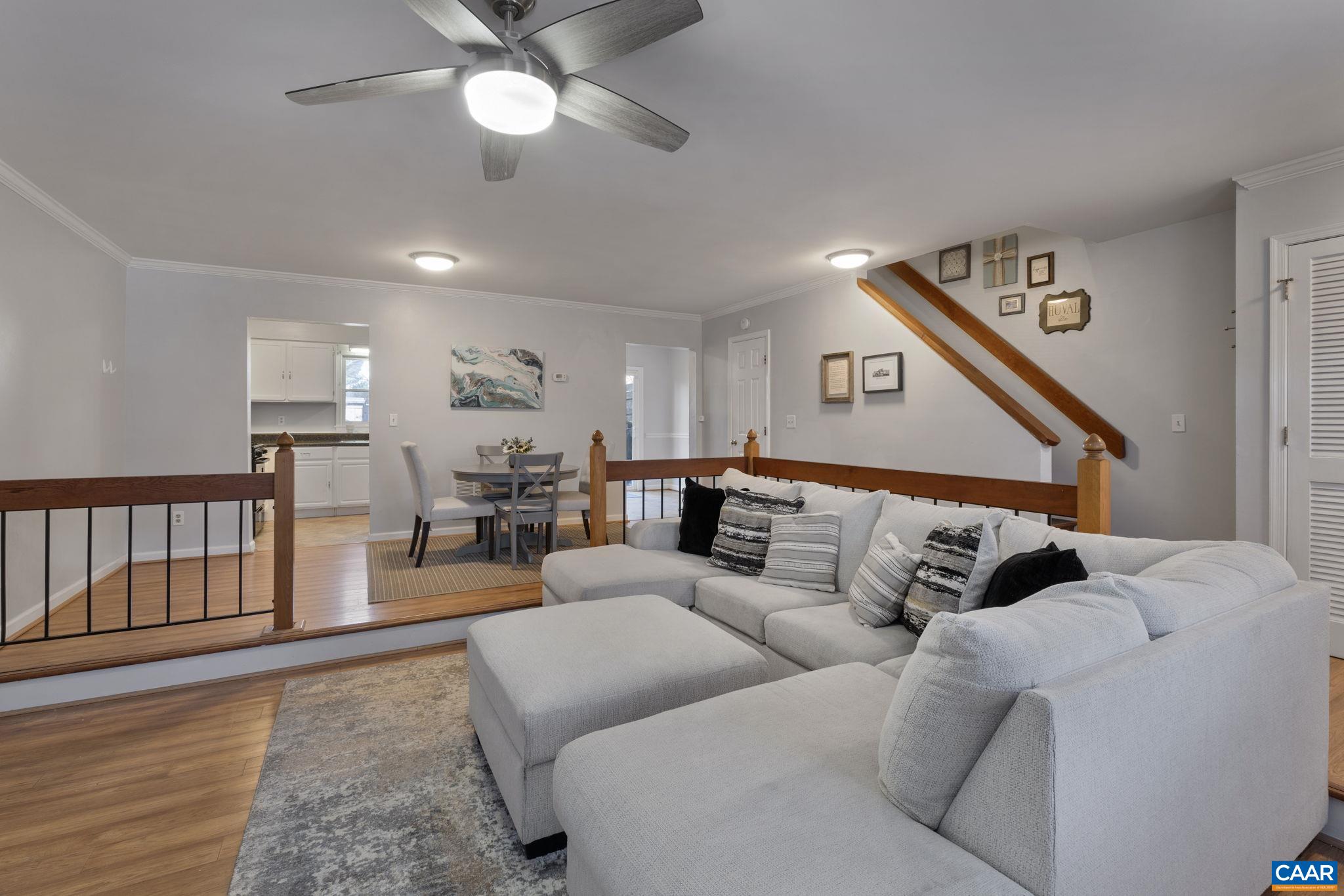 1540 Minor Ridge Court Charlottesville, VA 22901 - Photo 3 of 26 a living room with furniture and a wooden floor