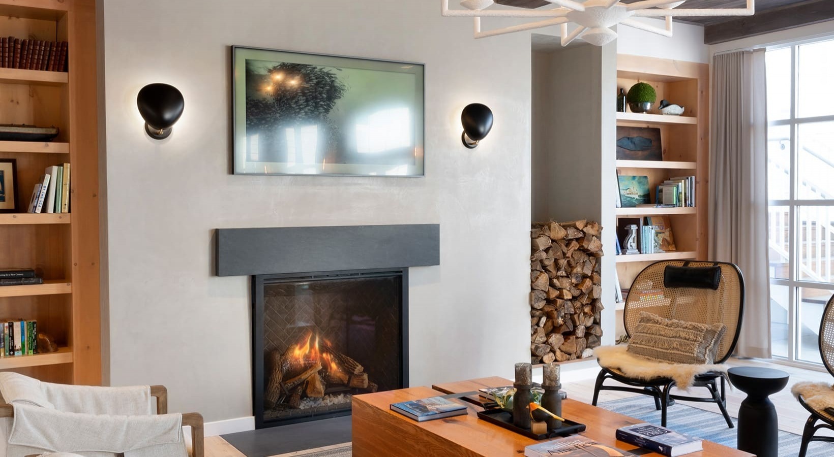 333 Unquowa Road, Unit 322 Fairfield, CT 06824 - Photo 3 of 12 a living room with furniture and a fireplace