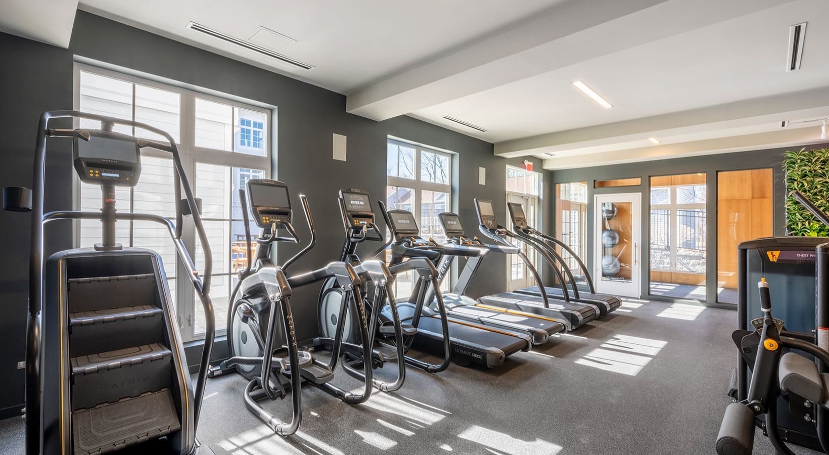333 Unquowa Road, Unit 322 Fairfield, CT 06824 - Photo 9 of 12 a view of a room with gym equipment
