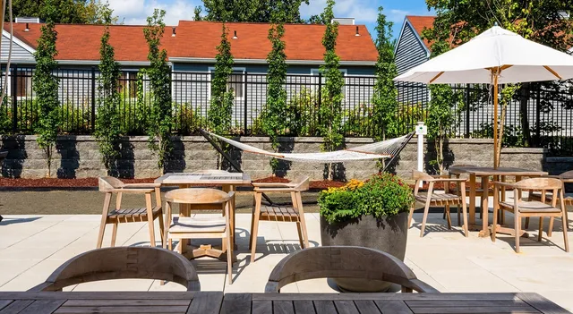 a view of a dinning tables and chairs in the patio