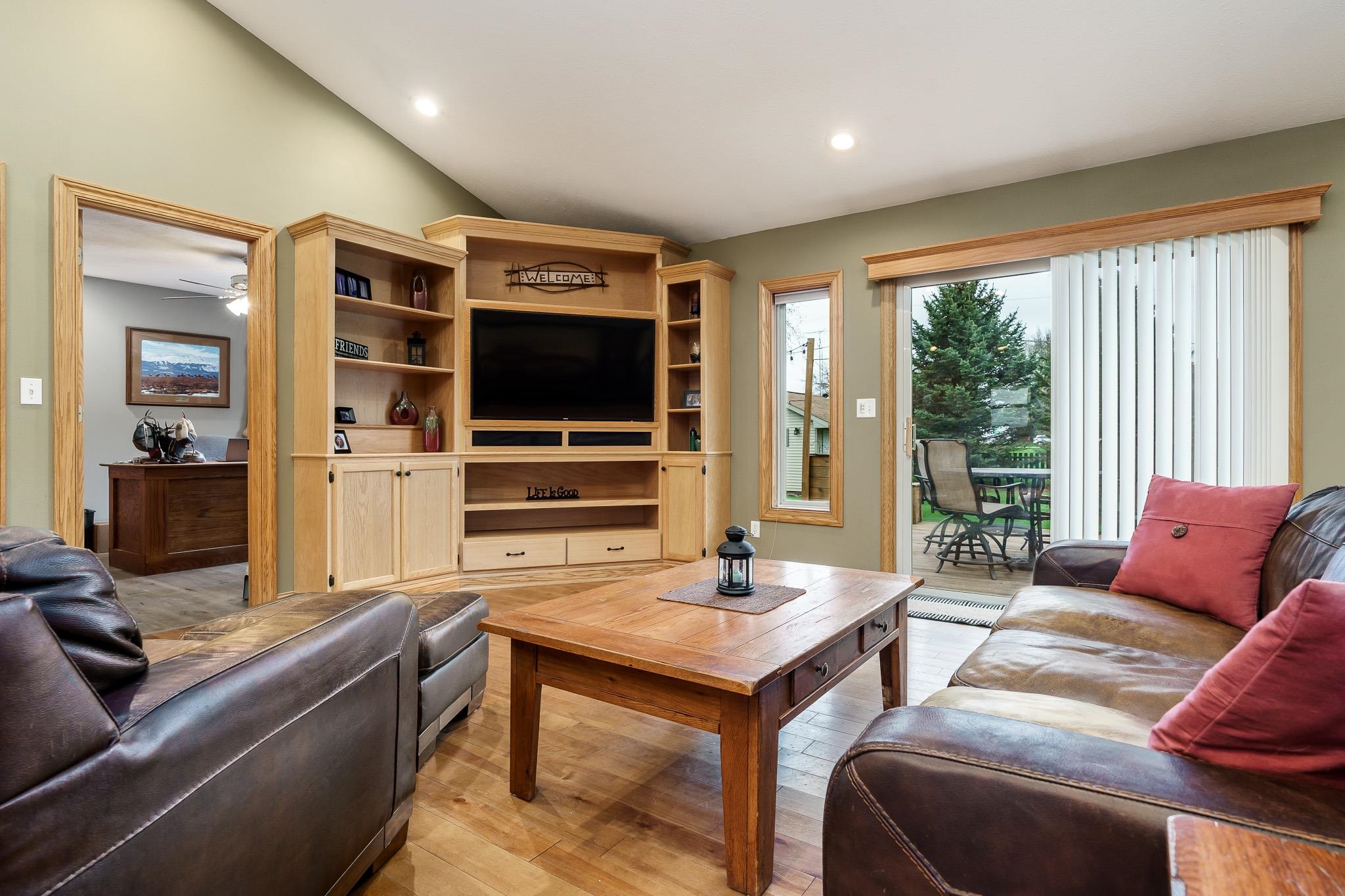 2615 Graham Road Belvidere, IL 61008 - Photo 16 of 39 a living room with furniture and a flat screen tv