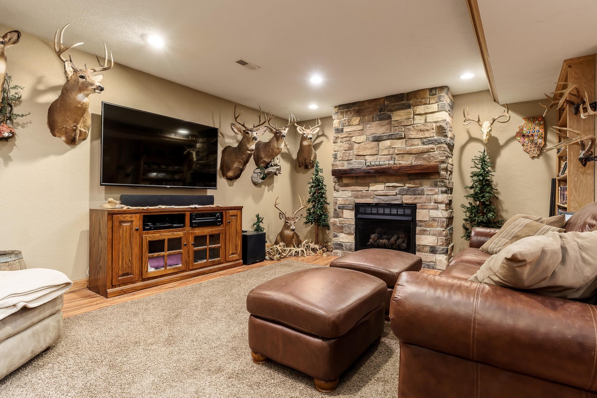 2615 Graham Road Belvidere, IL 61008 - Photo 25 of 39 a living room with furniture and a flat screen tv