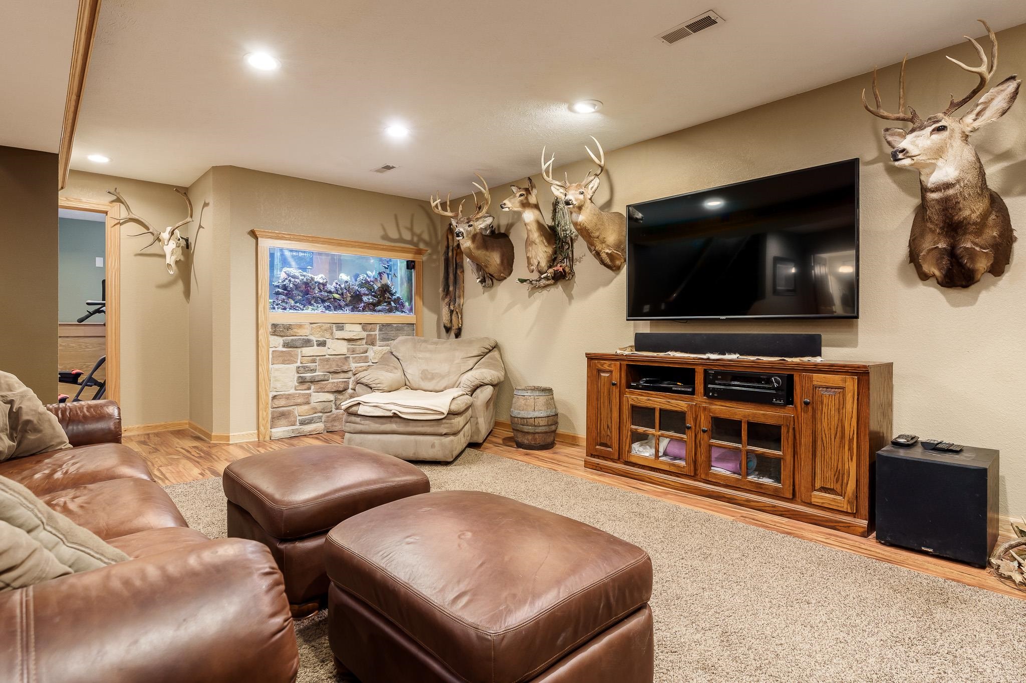 2615 Graham Road Belvidere, IL 61008 - Photo 26 of 39 a living room with furniture and a flat screen tv