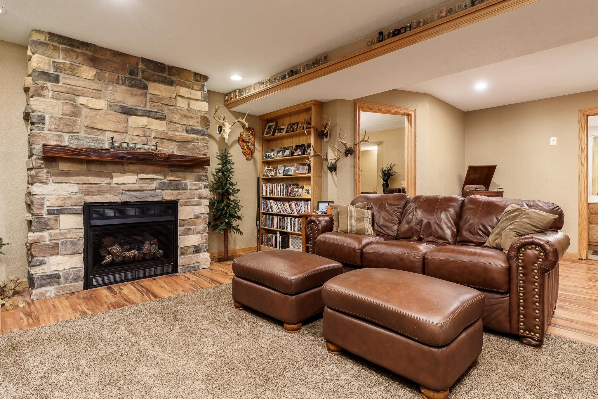 2615 Graham Road Belvidere, IL 61008 - Photo 27 of 39 a living room with furniture and a fireplace