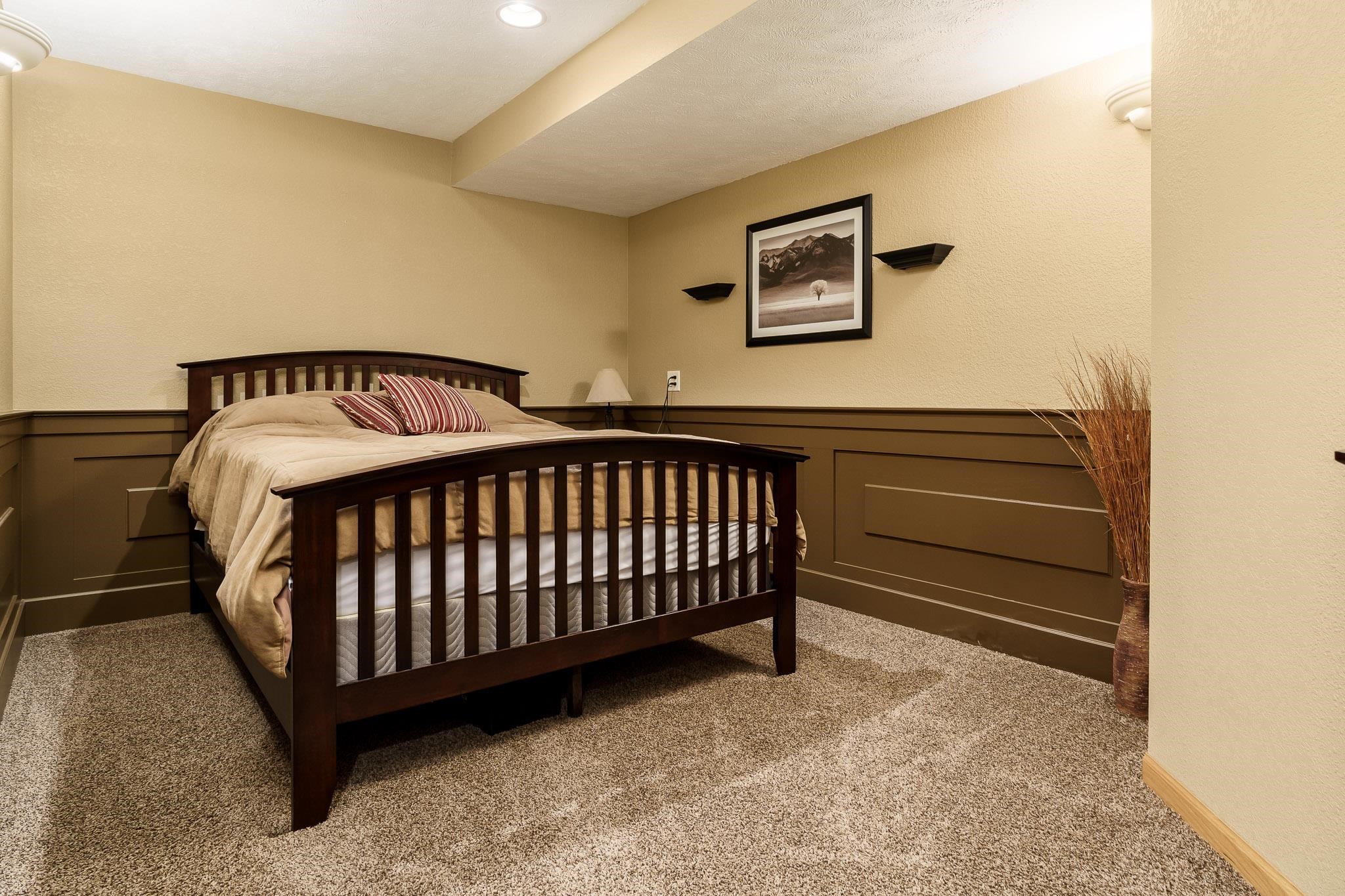 2615 Graham Road Belvidere, IL 61008 - Photo 36 of 39 a bedroom with a bed and painting on the wall