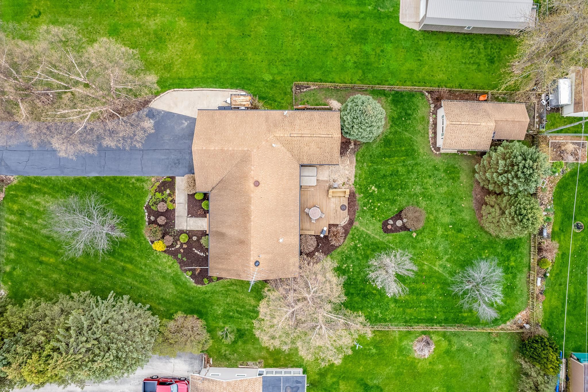 2615 Graham Road Belvidere, IL 61008 - Photo 4 of 39 an aerial view of a house with a yard and trees all around