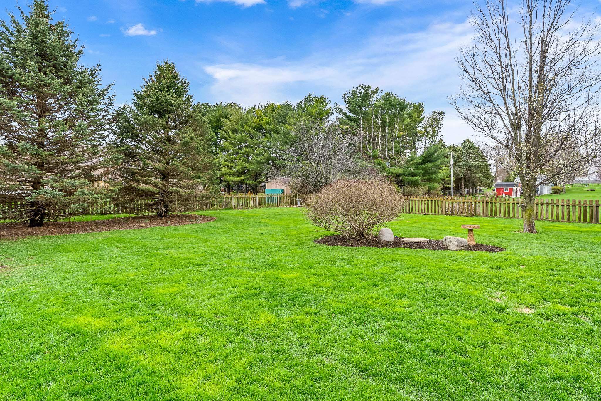 2615 Graham Road Belvidere, IL 61008 - Photo 5 of 39 a view of a garden with a slide