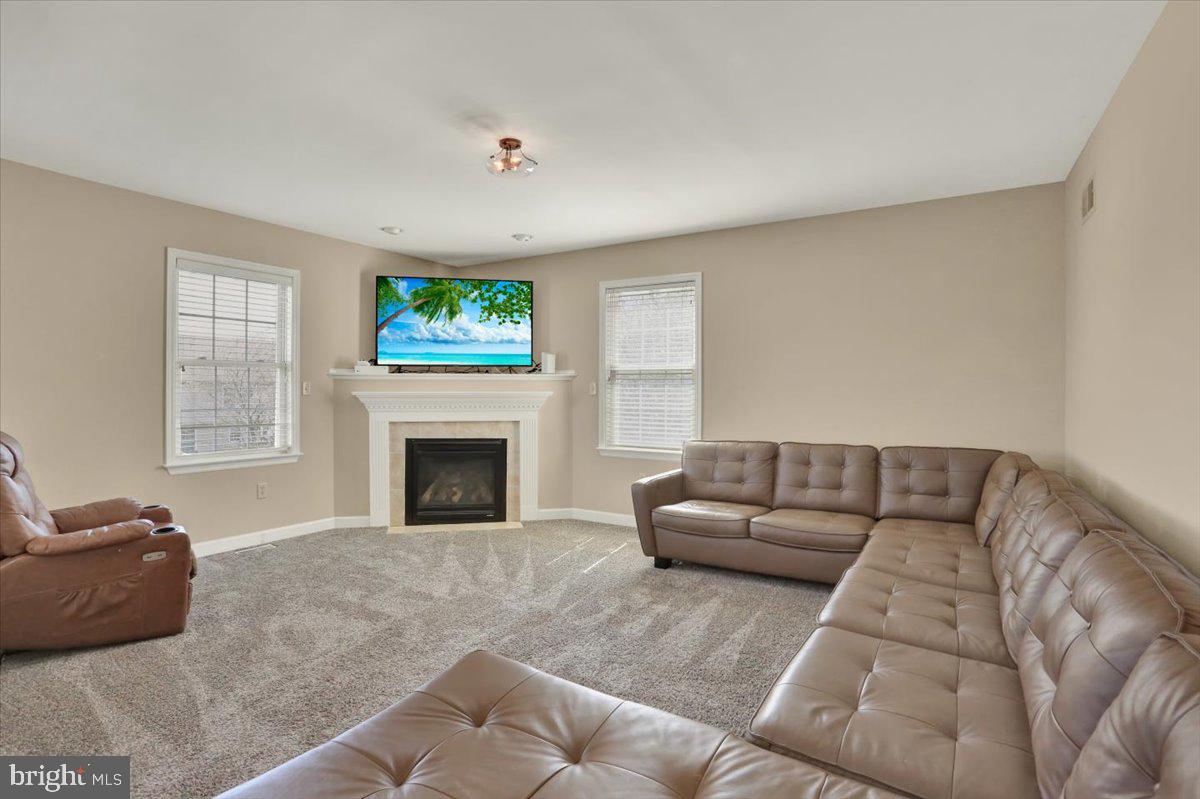 5107 Stoudts Ferry Bridge Road Reading, PA 19605 - Photo 11 of 40 family room w/ gas fireplace