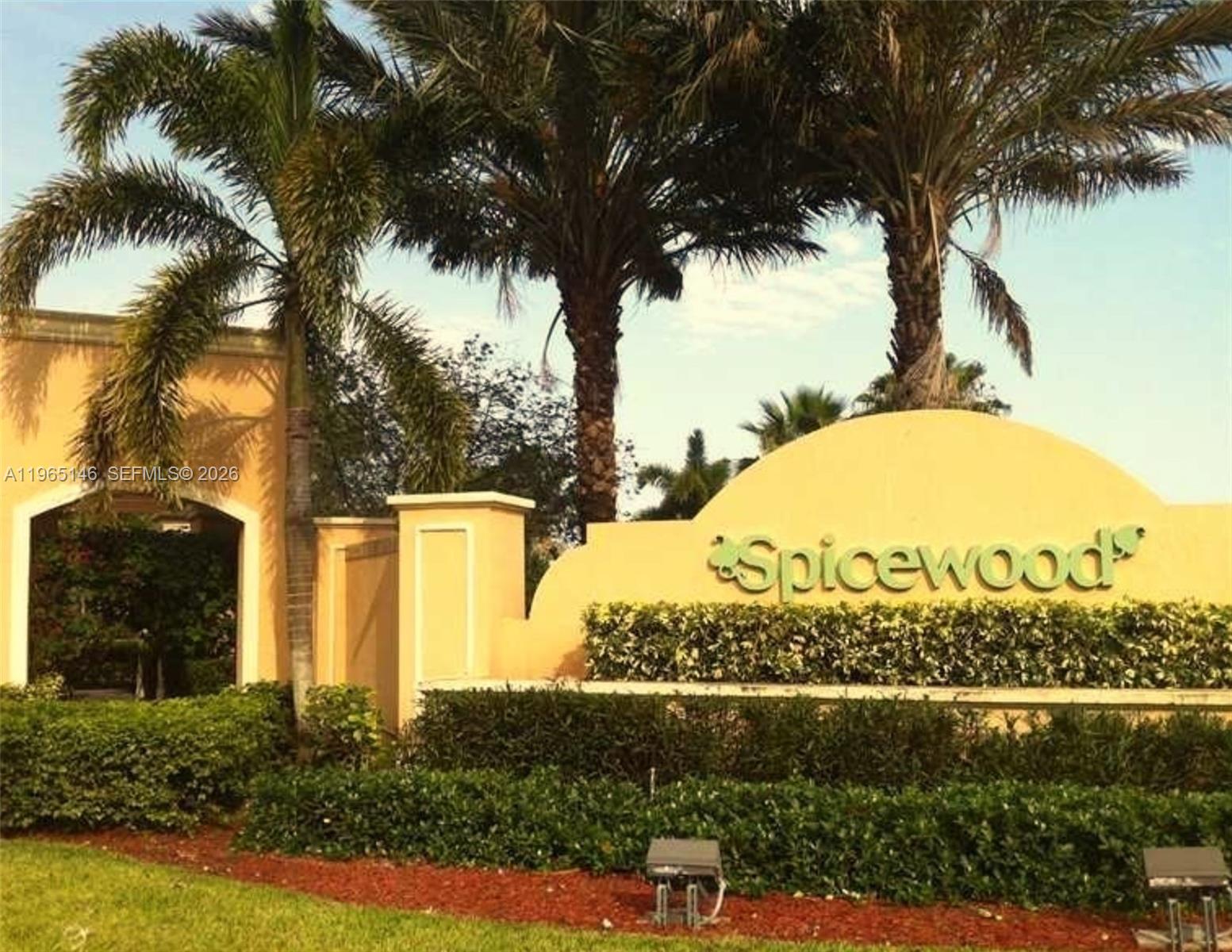 23712 Southwest 110th Avenue Homestead, FL 33032 - Photo 7 of 7 a view of a water fountain with a tree in the background