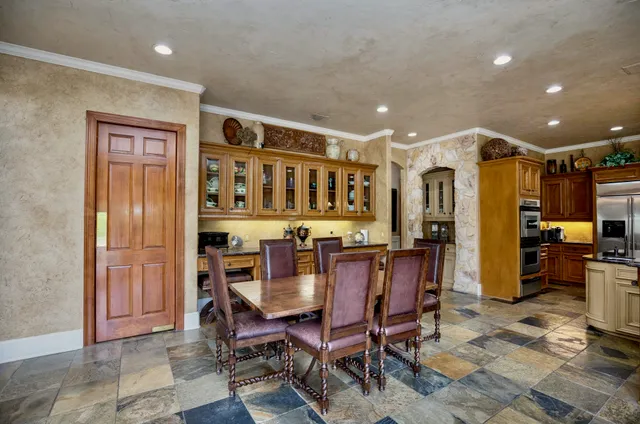a view of a dining room with furniture