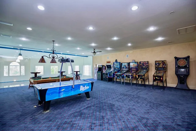 a view of living room filled with furniture and window