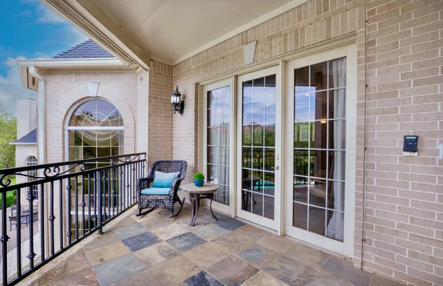a bedroom with furniture and windows