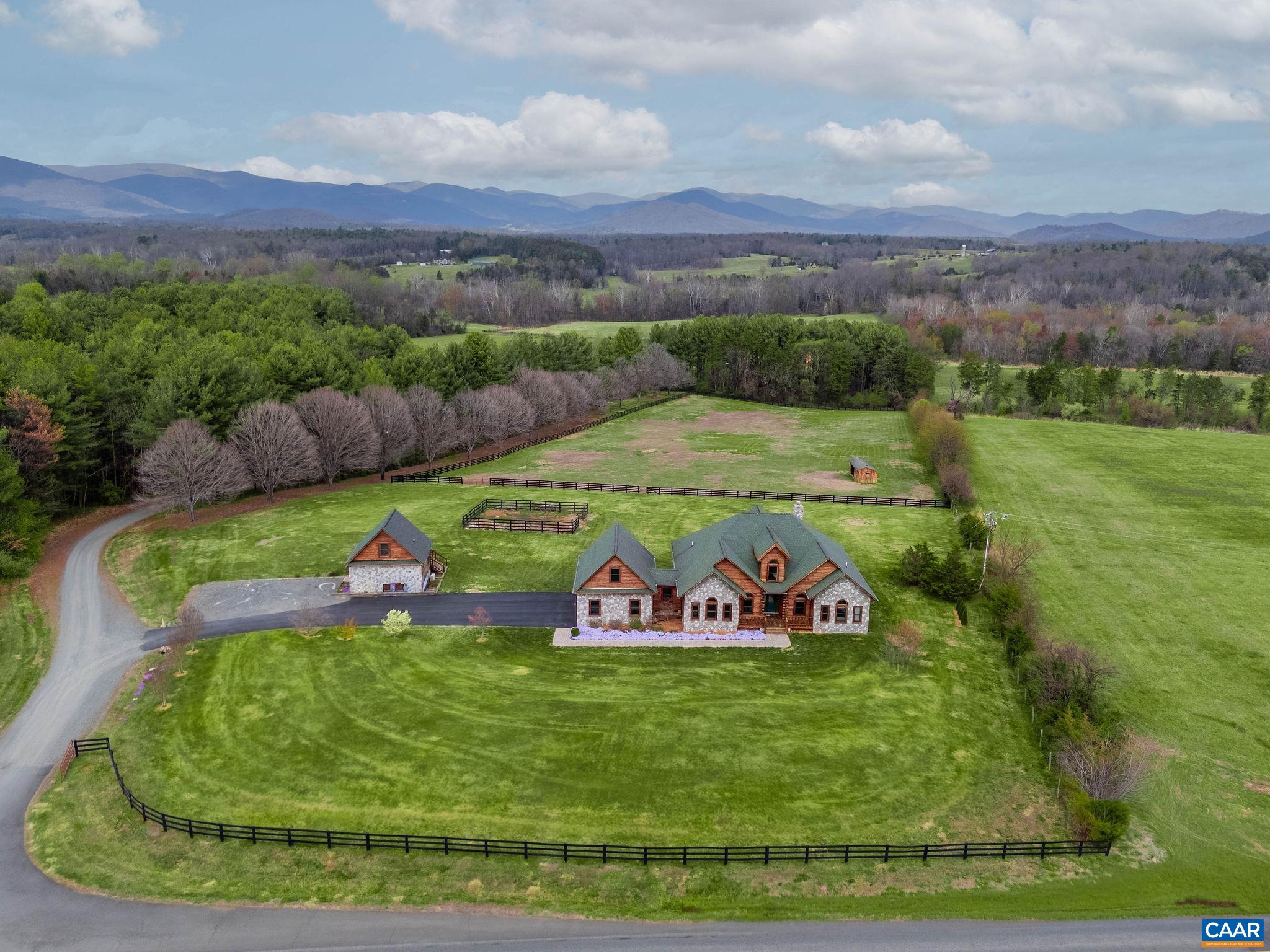 42 River Ridge Lane Stanardsville, VA 22973 - Photo 69 of 70 a view of a golf course with a garden