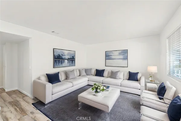 a living room with furniture and a couch