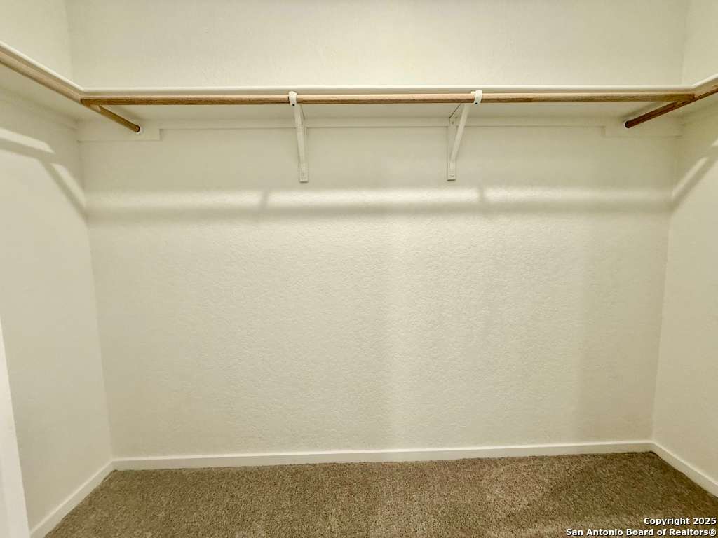 10319 Munoz Manor San Antonio, TX 78214 - Photo 11 of 13 a view of an empty walk in closet