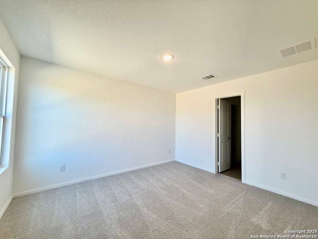 10319 Munoz Manor San Antonio, TX 78214 - Photo 10 of 13 a view of an empty room