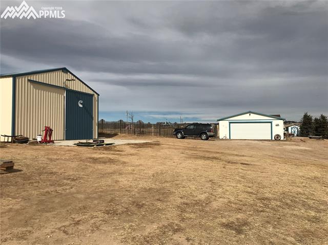 14820 Trigger Road Peyton, CO 80831 - Photo 35 of 36 Exterior Side Of House And Shop