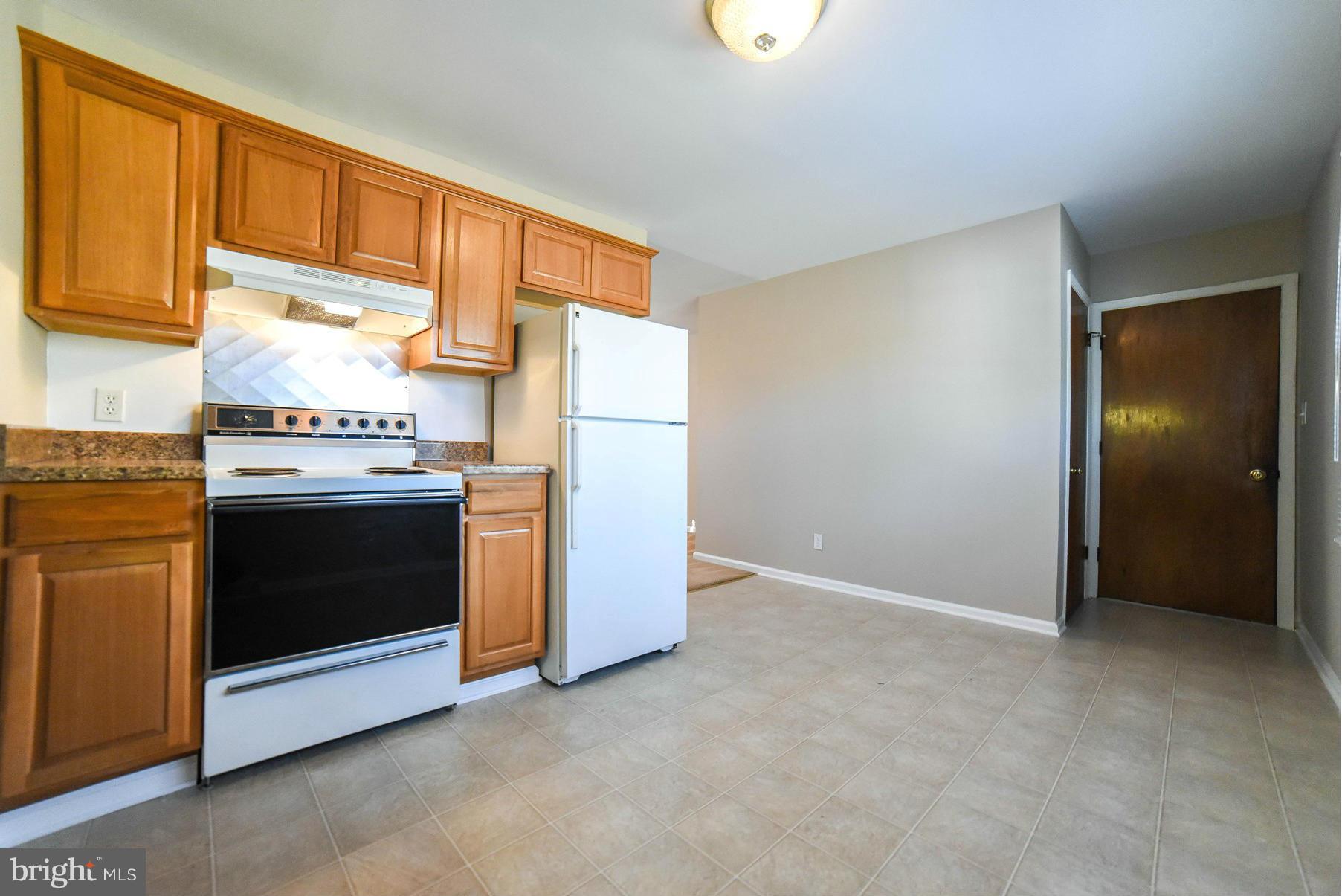 22084 Fox Ridge Road Lexington Park, MD 20653 - Photo 7 of 29 Kitchen w/recent vinyl flooring