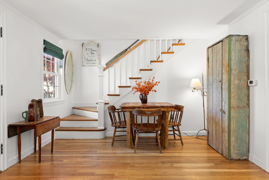18 Conant Street Beverly, MA 01915 - Photo 19 of 40 a view of entryway dining room and hall with wooden floor