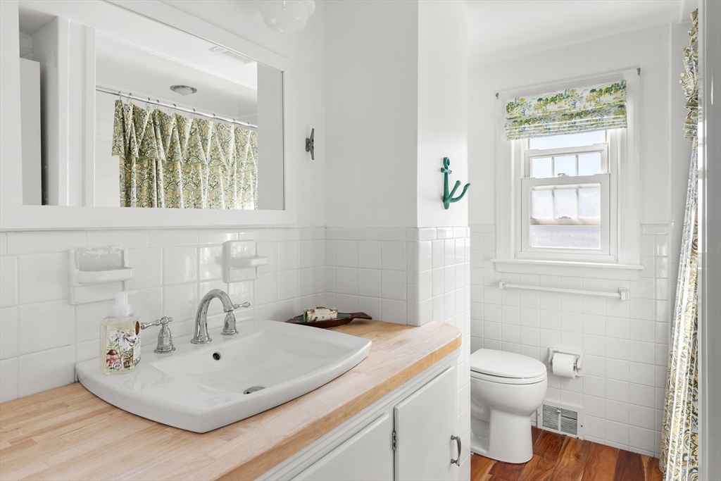 18 Conant Street Beverly, MA 01915 - Photo 23 of 40 a bathroom with a sink and a toilet