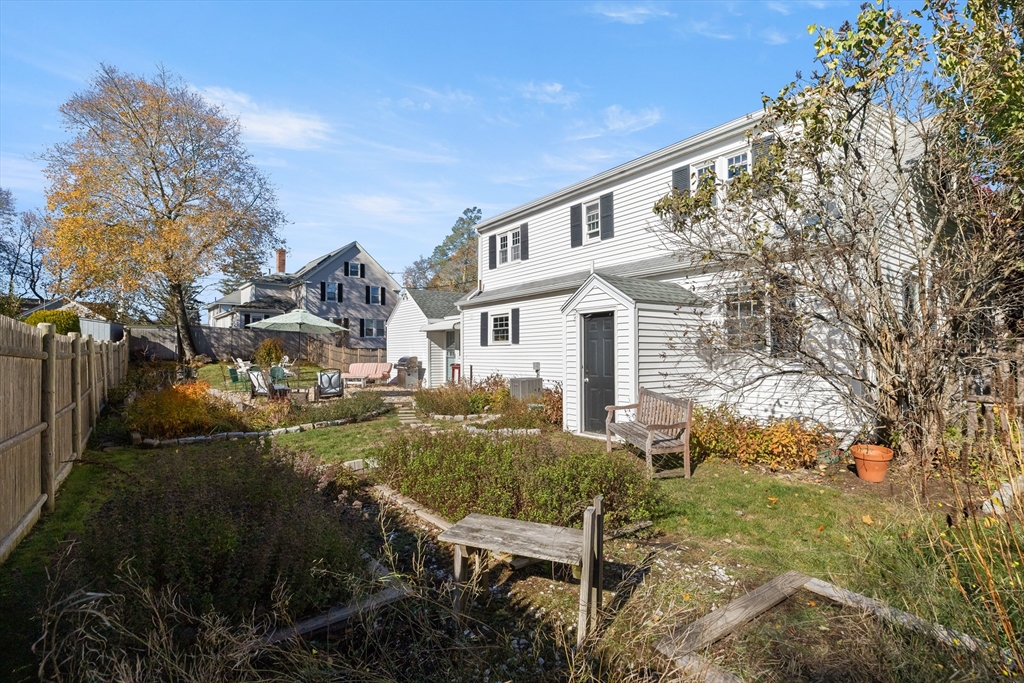 18 Conant Street Beverly, MA 01915 - Photo 36 of 40 a view of a house with backyard and sitting area
