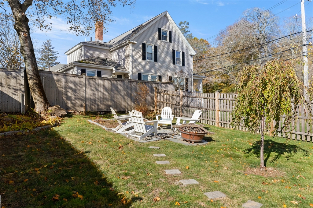 18 Conant Street Beverly, MA 01915 - Photo 38 of 40 a view of a house with backyard and sitting area