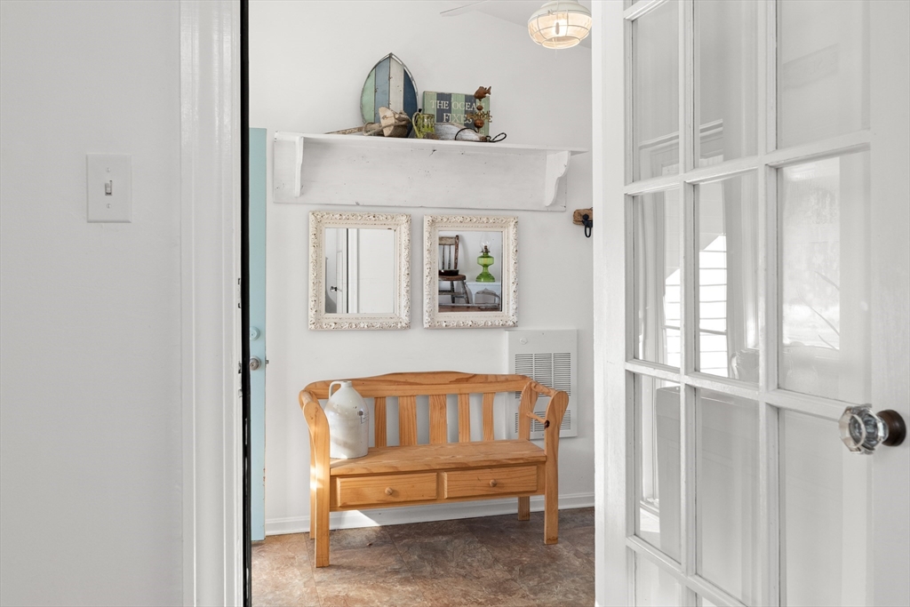 18 Conant Street Beverly, MA 01915 - Photo 4 of 40 a view of a bedroom with wooden floor and a window