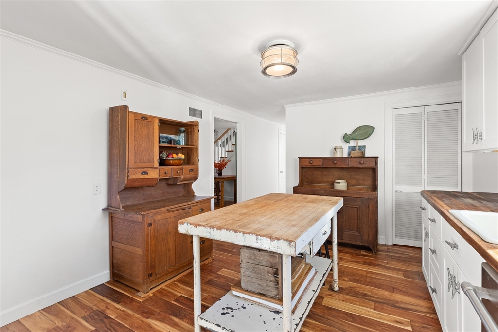 18 Conant Street Beverly, MA 01915 - Photo 9 of 40 a dining room with a table and chairs