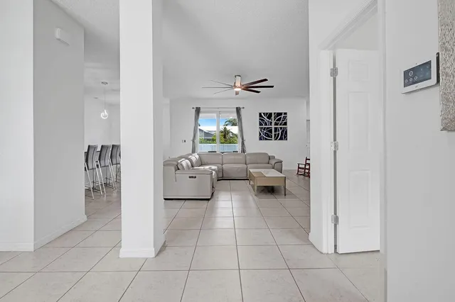 a living room with furniture and a rug