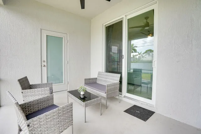 a living room with furniture and a window