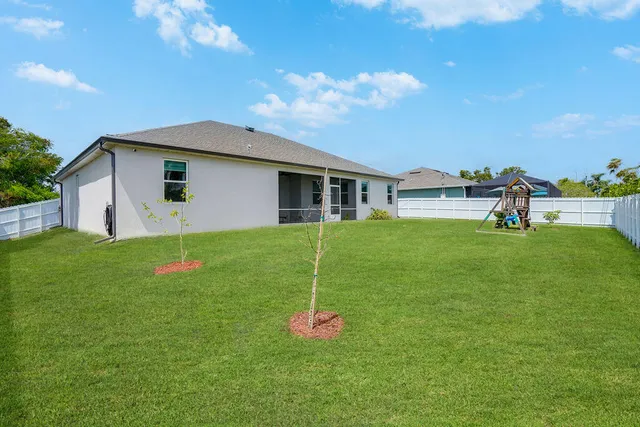 a house view with a garden space