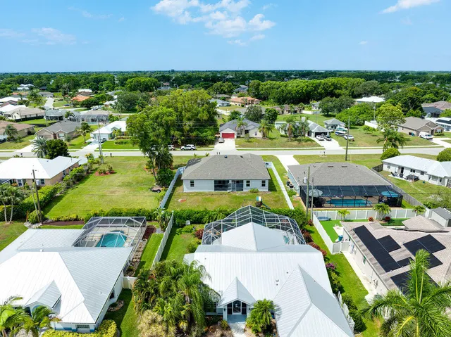 an aerial view of a house with a garden