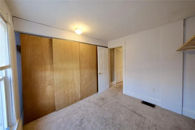 a view of hallway with shower