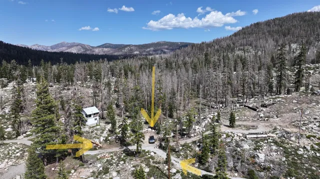a view of a lake with a mountain in the background