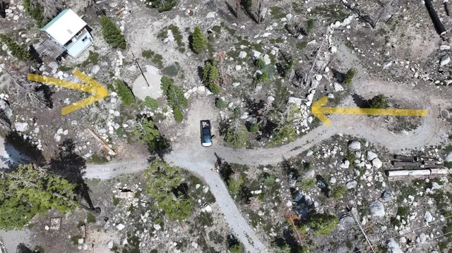 a view of outdoor space with lots of trees
