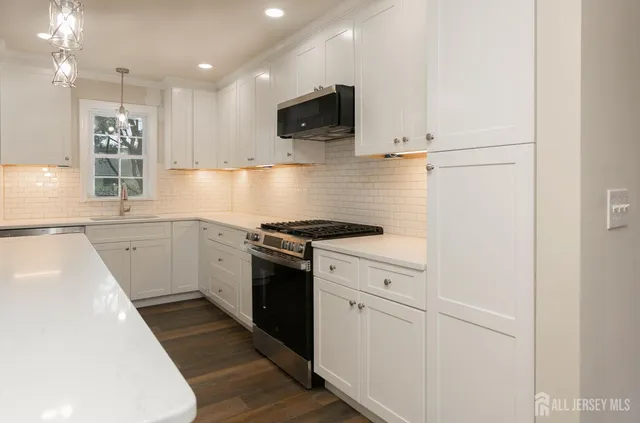 a bedroom with a large bed and a couch