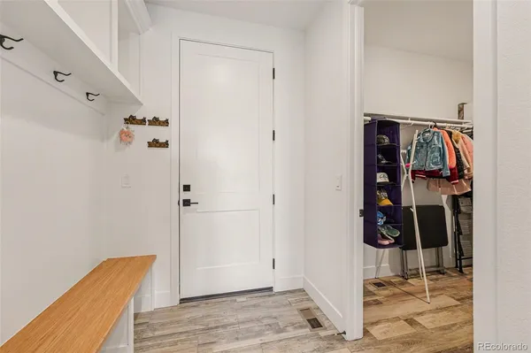 a house with pool in front of it