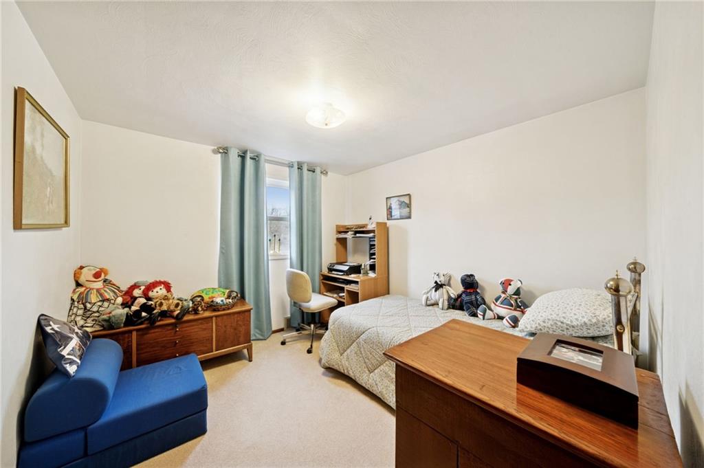 140 Possum Hollow Road Greensburg, PA 15601 - Photo 18 of 40 a bedroom with furniture and a bed