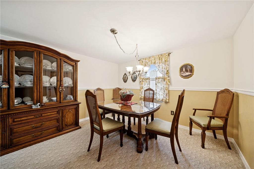 140 Possum Hollow Road Greensburg, PA 15601 - Photo 10 of 40 a view of a dining room with furniture and window
