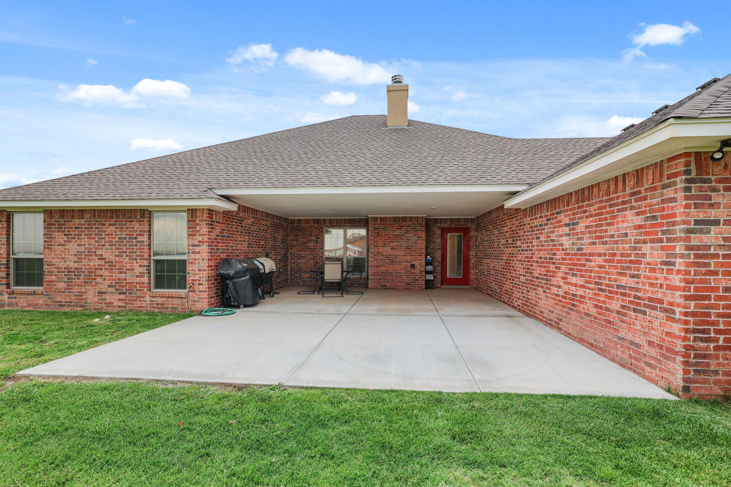 17450 Stone Creek Road Amarillo, TX 79124 - Photo 28 of 30 a view of a house with a patio