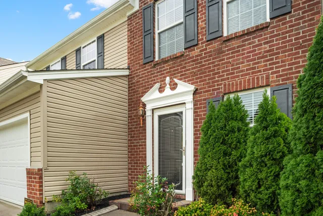 a front view of house with yard