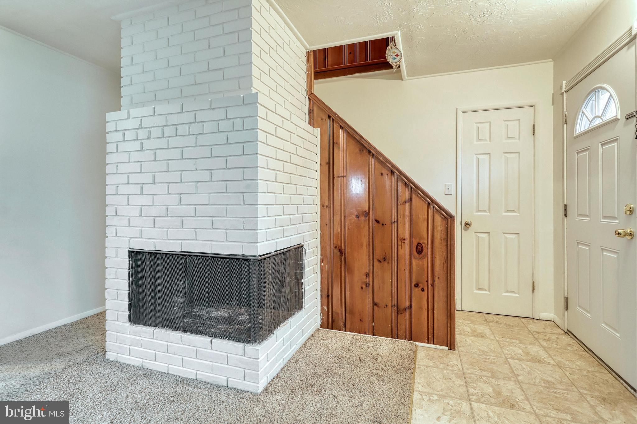 1232 Wogan Road York, PA 17404 - Photo 6 of 25 Wood Fireplace in Living Room