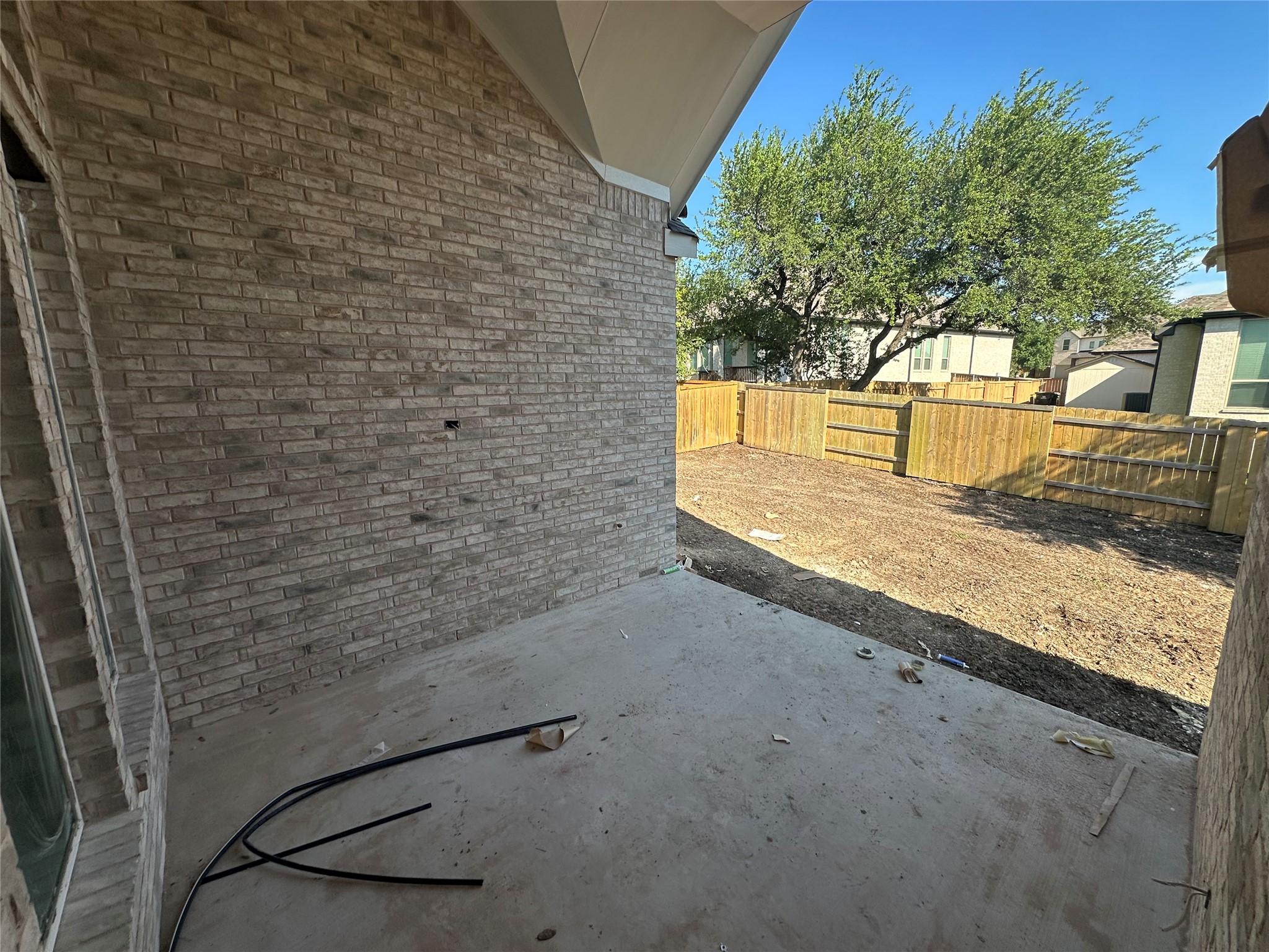 153 Mineral River Loop Kyle, TX 78640 - Photo 11 of 18 Rear Covered Patio & Private Backyard